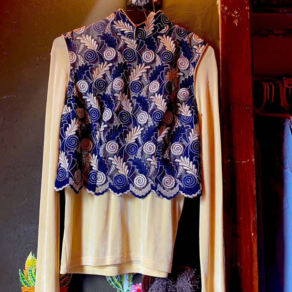 blue and gold show top